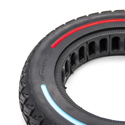 Rueda Maciza Ultraligera 10x2,125 Offroad. Línea roja, azul y amarilla